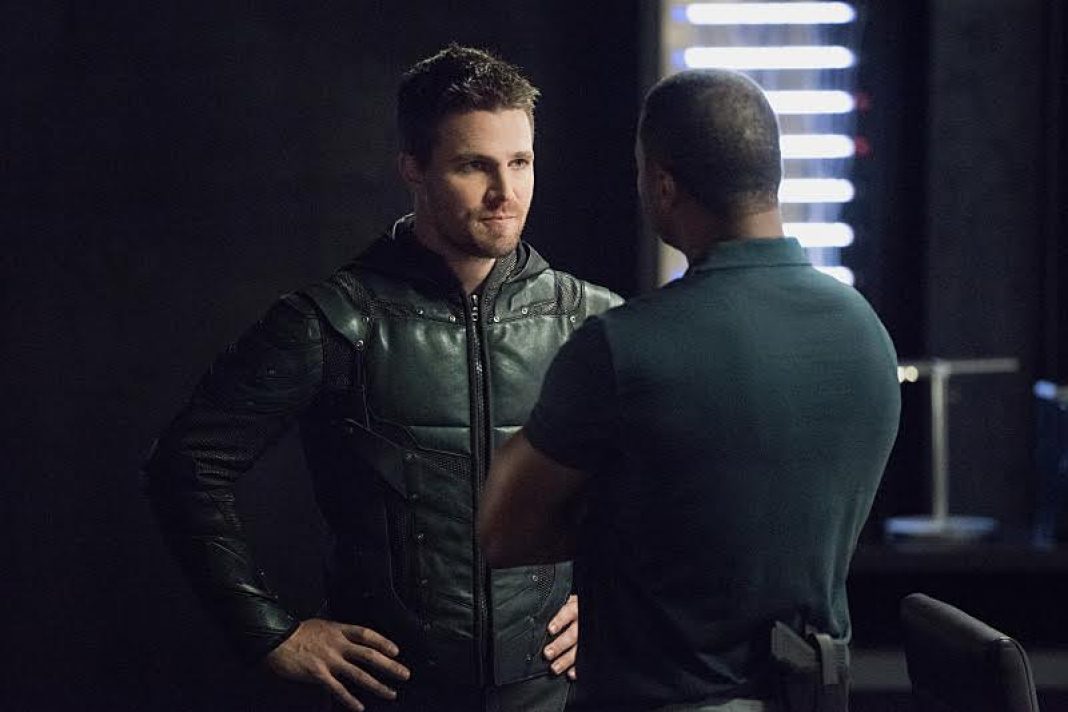 Arrow -- "Human Target" -- Image AR505a_0014.jpg -- Pictured (L-R): Stephen Amell as Oliver Queen/The Green Arrow and David Ramsey as John Diggle -- Photo: Dean Buscher/The CW -- ÃÂ© 2016 The CW Network, LLC. All Rights Reserved.