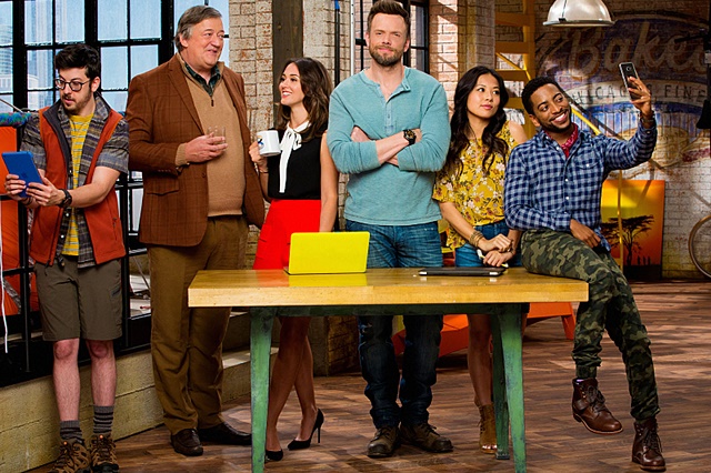 THE GREAT INDOORS stars Joel McHale (center) in a comedy about a renowned adventure reporter for an outdoor magazine who must adapt to the times when he's assigned by the magazine's founder (Stephen Fry, second from left) to be the desk-bound boss to a group of millennials (Christine Ko, second from right; Shaun Brown, far right; and Christopher Mintz-Plasse, far left) in the magazine's digital department. In his new role, Jack reports to Roland's daughter, Brooke (Susannah Fielding, third from left). This fall, THE GREAT INDOORS will be broadcast Thursdays (8:30-9:00 PM, ET/PT) on the CBS Television Network. Photo: Cliff Lipson/CBS é2016 CBS Broadcasting, Inc. All Rights Reserved